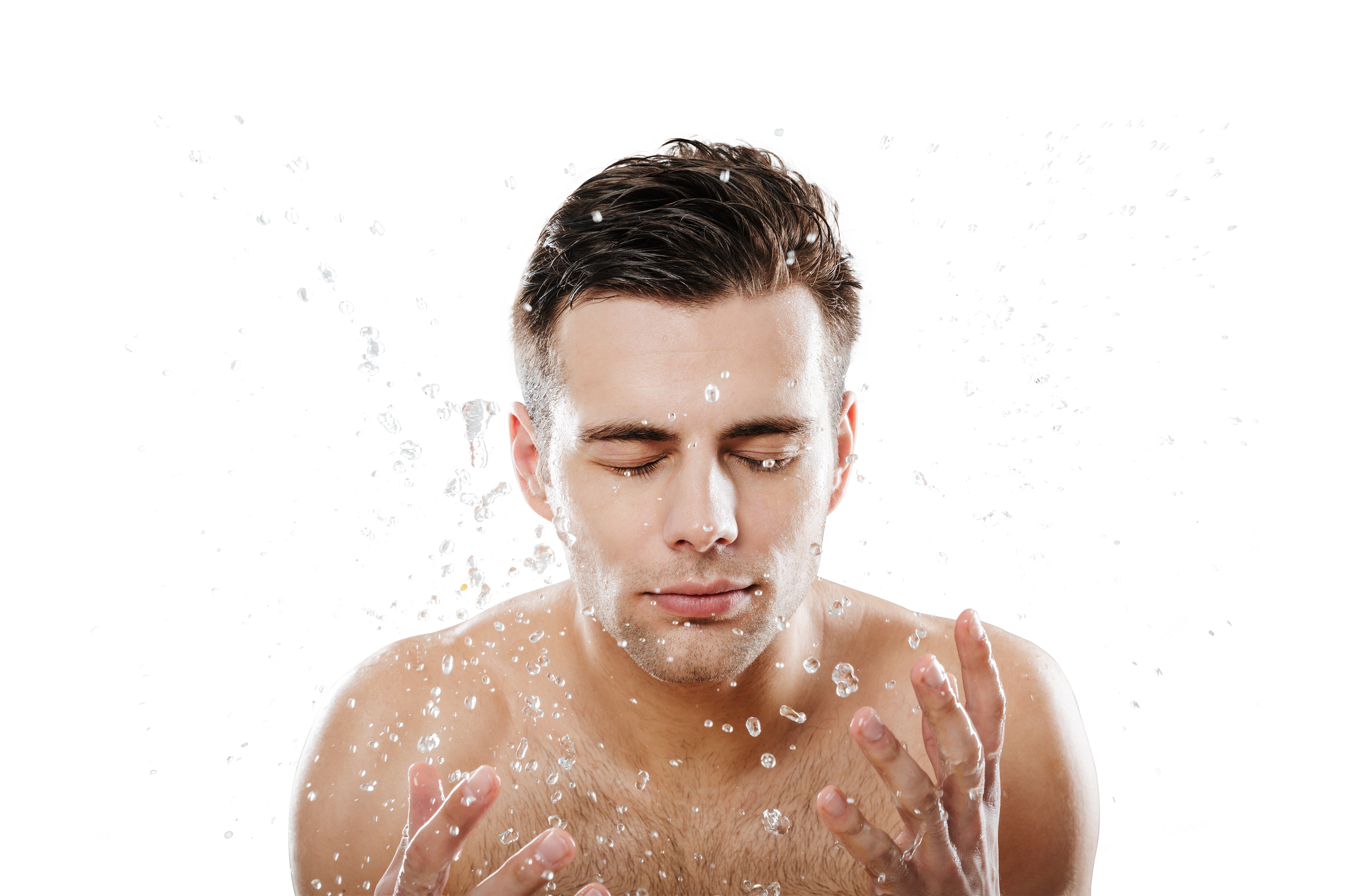 Male splashing face with water.